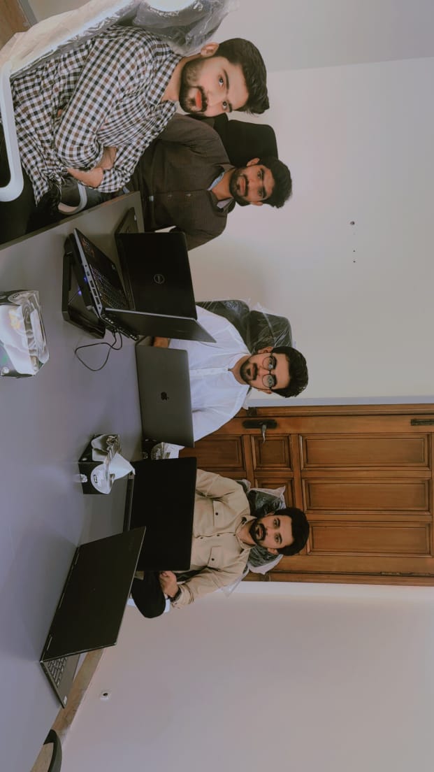 Muhammad Hamza with Team in office