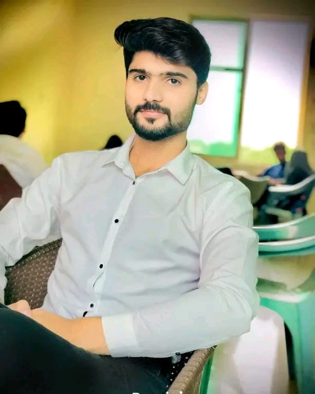 Muhammad Hamza in white shirt